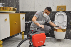 رفع گرفتگی لوله توالت شهرک غرب